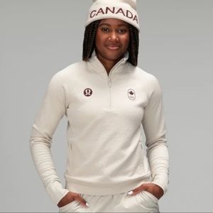 Lululemon team Canada half zip. Size 4